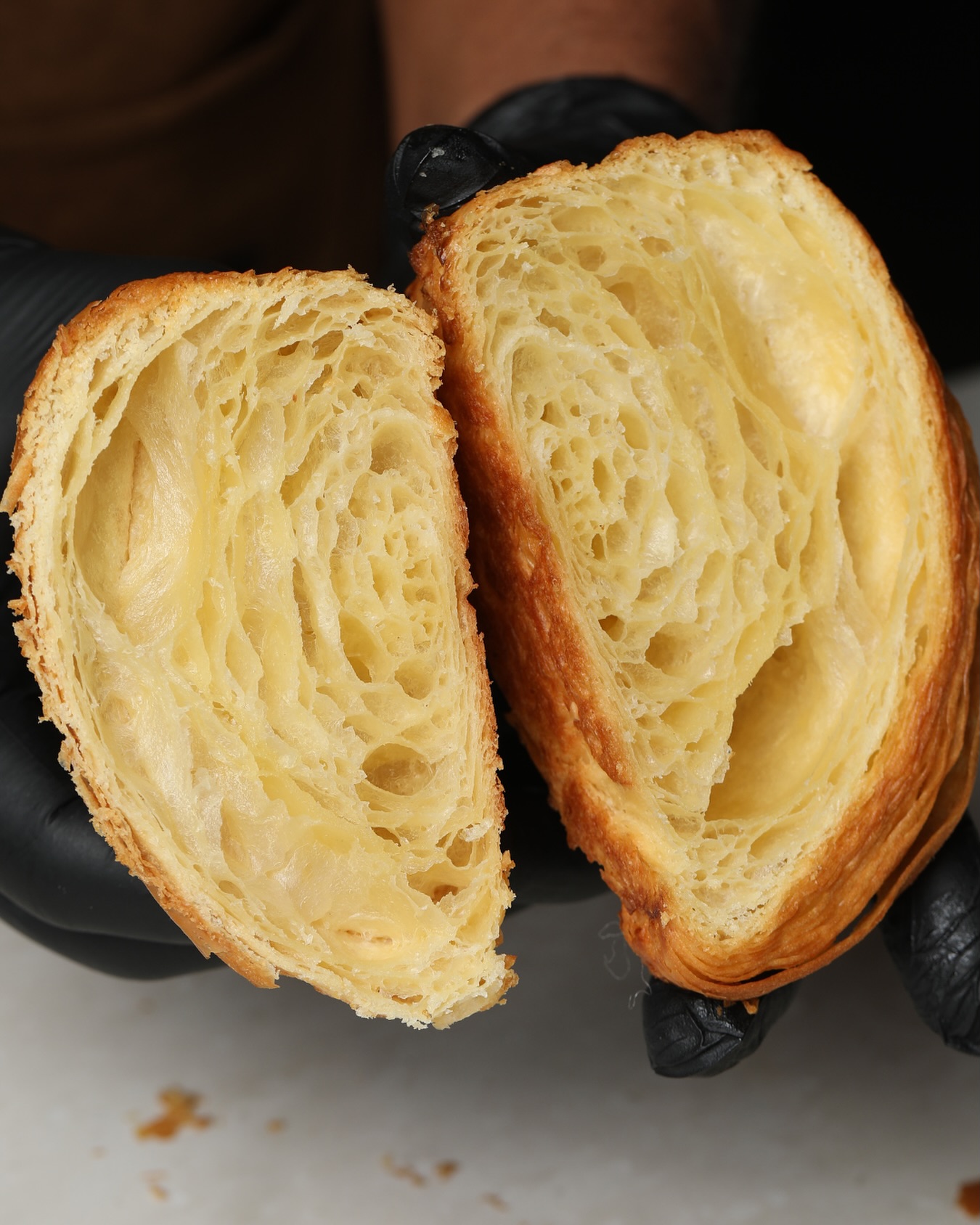 Cross-section of a Slo Labs croissant showing honeycomb lamination layers